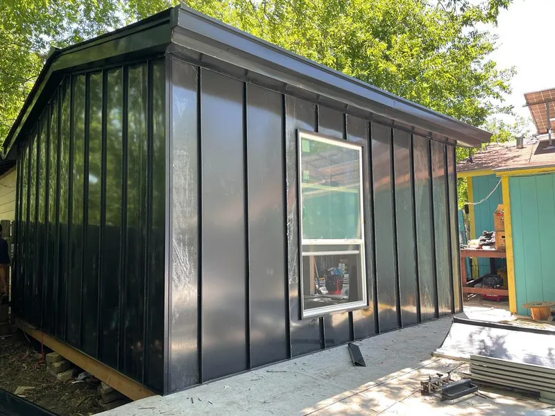 Black standing seam metal wall panels for Metal Roof Installation in Prairie du Chien