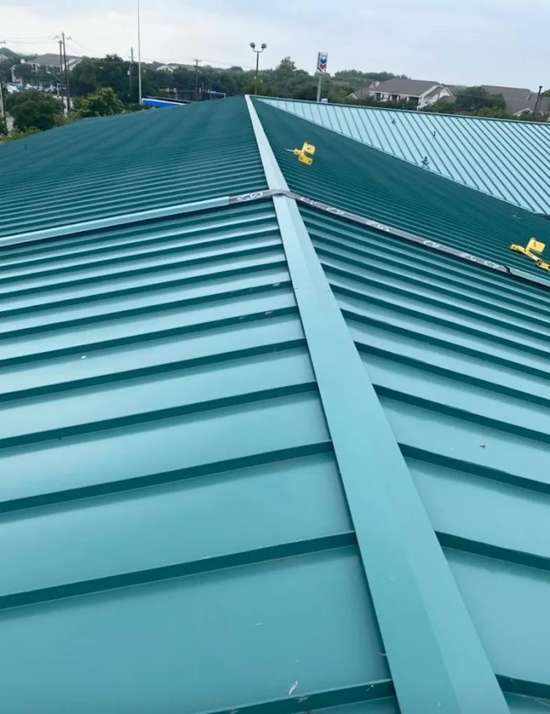 Green commercial metal roof ridge and valley for Metal Roof Repair in Prairie du Chien