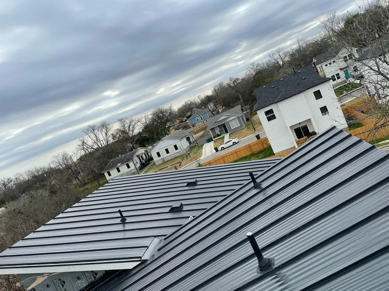 Standing seam metal roof panels with vents for Skylight Repair in Prairie du Chien